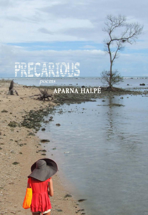 A young girl in a red dress and large hat walks along a sandy beach, with calm water and a solitary tree in the background.